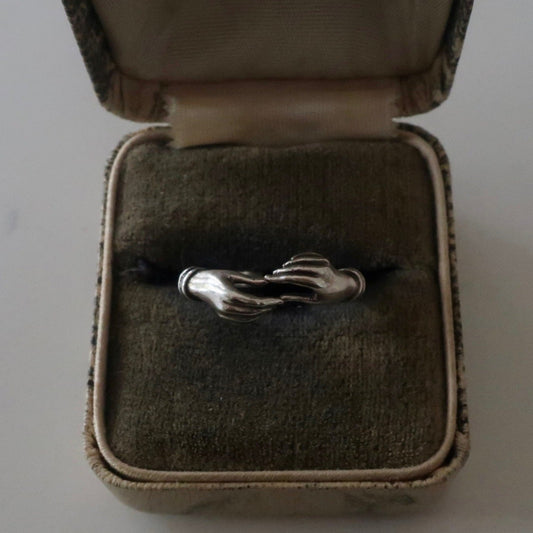 Sterling Hands Ring